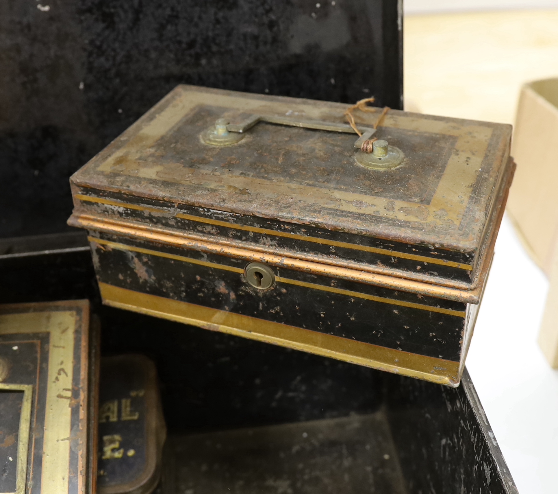 A collection of early to mid century and 20th century tins, a ladies tea disc, a sea cadet corps disc/badge